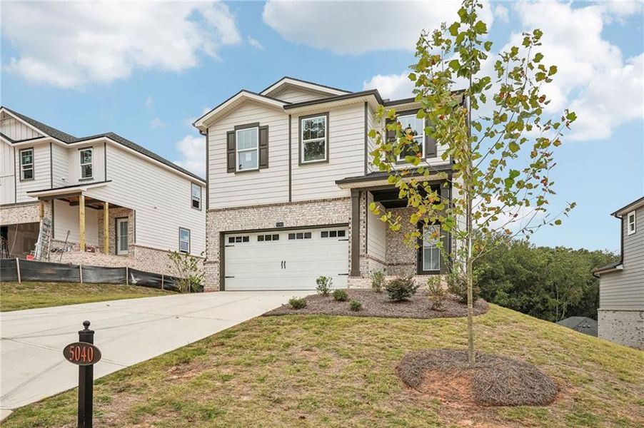 Front exterior of a new home in Hemingway - Reserve Series, Cumming, GA, highlighting curb appeal (Image 30).