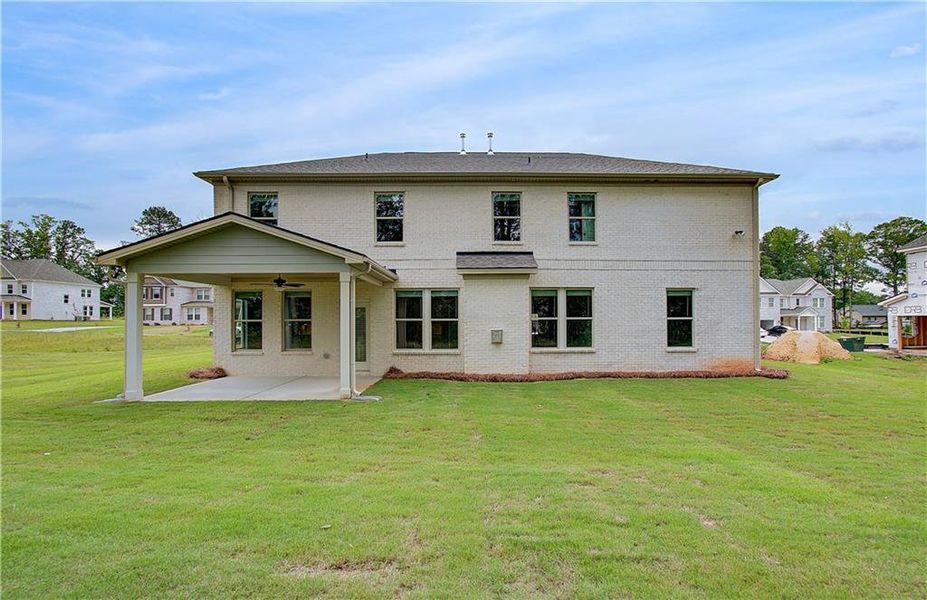 Exterior details and patio area of a home in Cambria at Traditions, Hampton (Image 2).