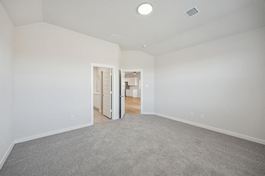 Primary Suite in the Oak II home plan by Trophy Signature Homes – REPRESENTATIVE PHOTO
