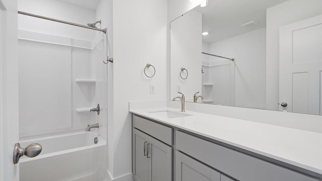Stylish guest bathroom with superior design and thoughtful storage solutions