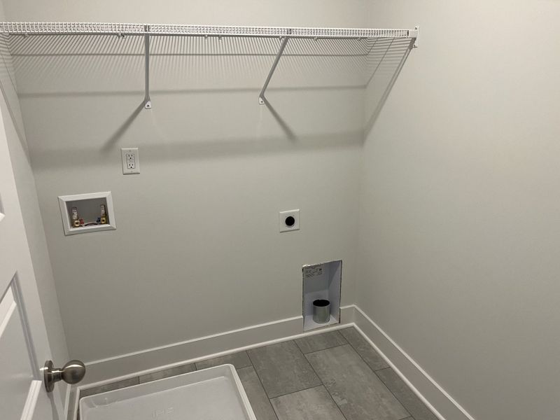 A real laundry room, upstairs with all the bedrooms