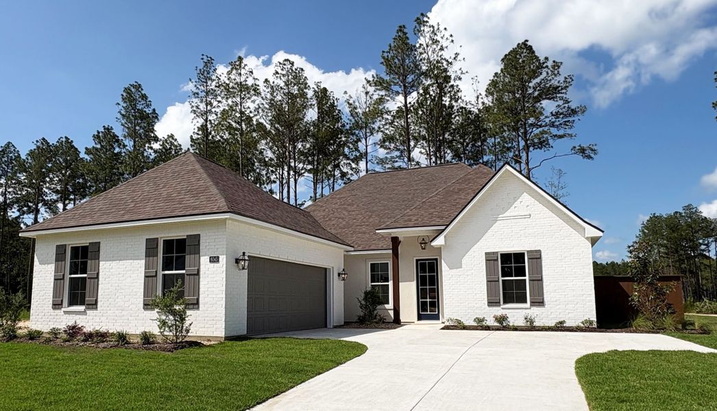 Front exterior of a new home in Longleaf, Lumberton, TX, highlighting curb appeal (Image 1). Front exterior of a new home in Longleaf, Lumberton, TX, highlighting curb appeal (Image 1).