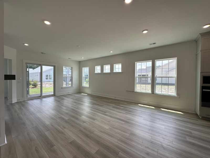 Spacious, unfurnished interior of a new home in Summerwind Crossing at Lakes of Cane Bay, Summerville (Image 6).