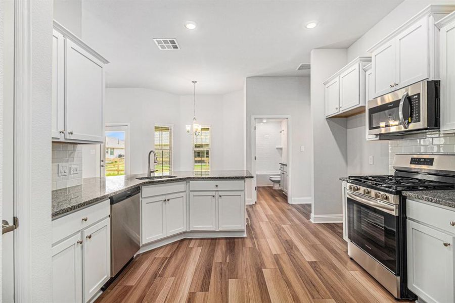 Kitchen with Breakfast Bar Area