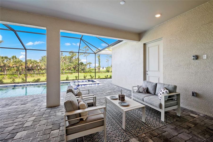 Exterior details and patio area of a home in Calusa Country Club, Lakewood Ranch (Image 2).