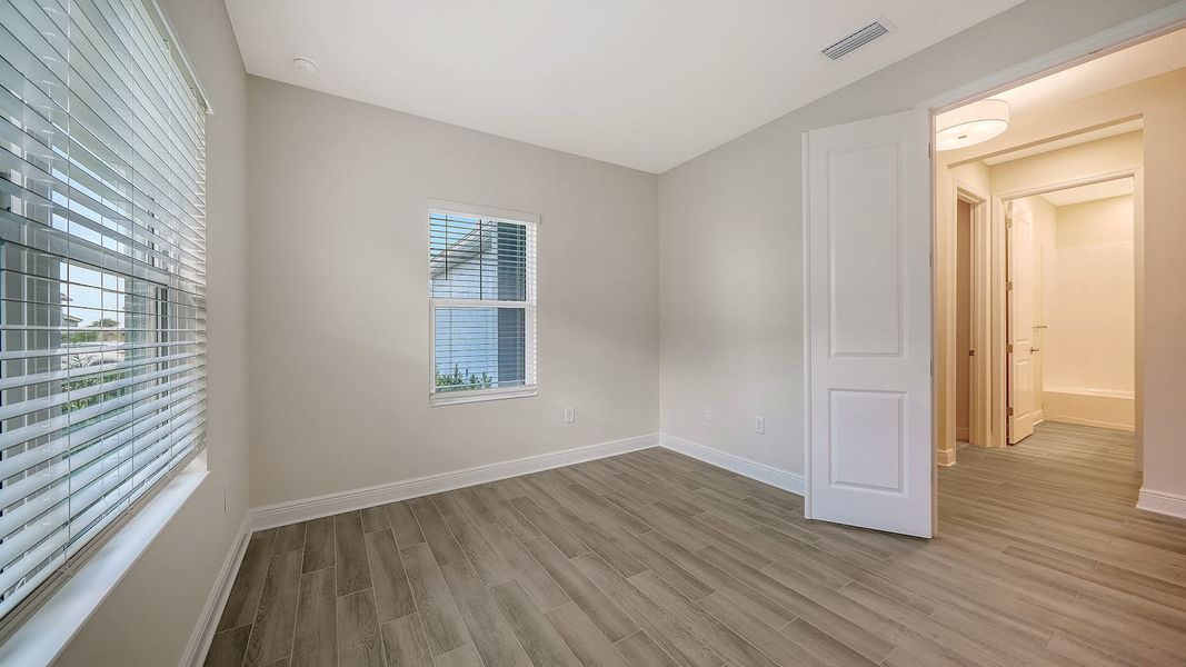 Spacious, unfurnished interior of a new home in Palm Grove Real Estate and Homes for Sale in Lakewood Ranch, FL - Neal Communities, Lakewood Ranch (Image 31). Spacious, unfurnished interior of a new home in Palm Grove Real Estate and Homes for Sale in Lakewood Ranch, FL - Neal Communities, Lakewood Ranch (Image 31).