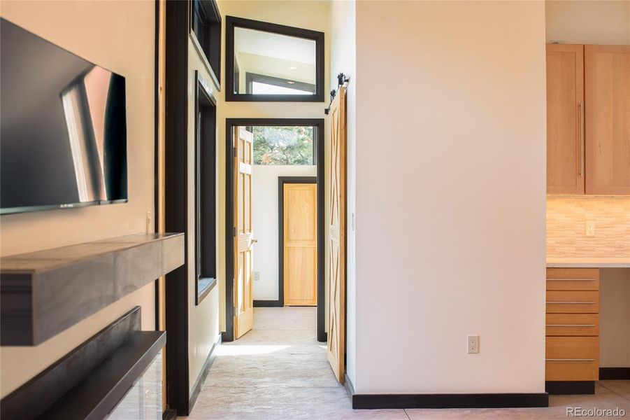 Hallway to primary wing of house