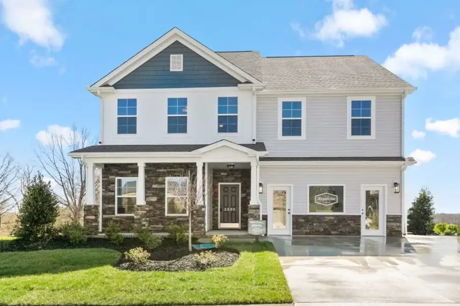 Front exterior of a new home in Trinity Meadows, Trinity, NC, highlighting curb appeal (Image 2). Front exterior of a new home in Trinity Meadows, Trinity, NC, highlighting curb appeal (Image 2).
