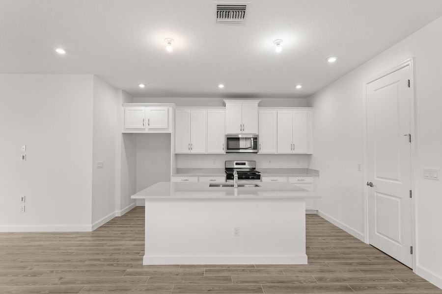 Furnished interior view inside a new home in Tradition - Kenley, Port St. Lucie (Image 4).