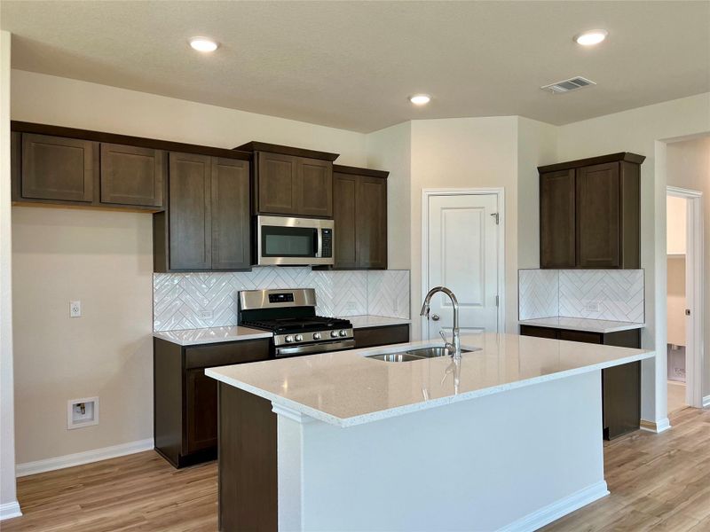Furnished interior view inside a new home in Anthem Cottages, Kyle (Image 4). Furnished interior view inside a new home in Anthem Cottages, Kyle (Image 4).