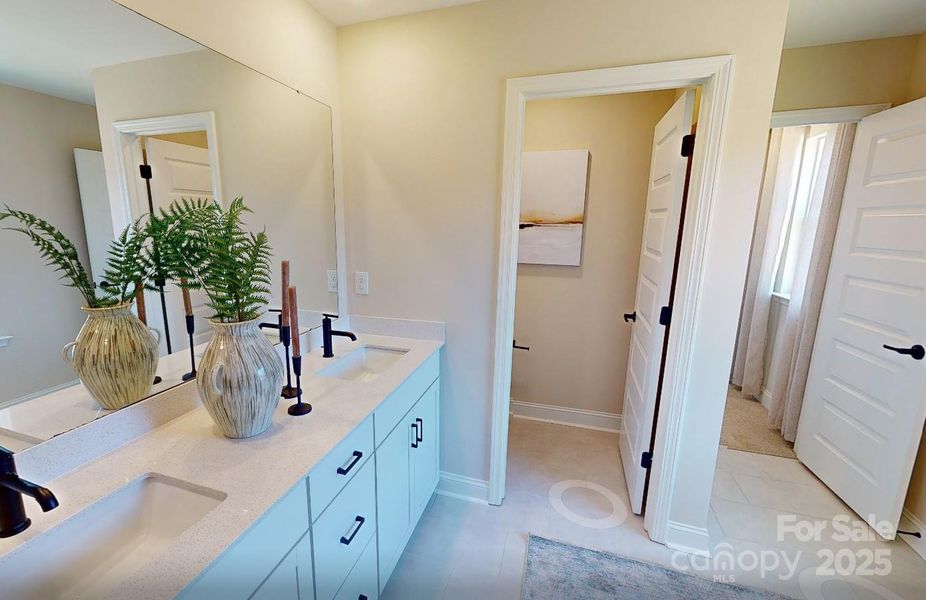 Example Photo from Decorated Model of the same plan. Materials/Options/Colors may vary. Please confirm selections with onsite sales counselor.