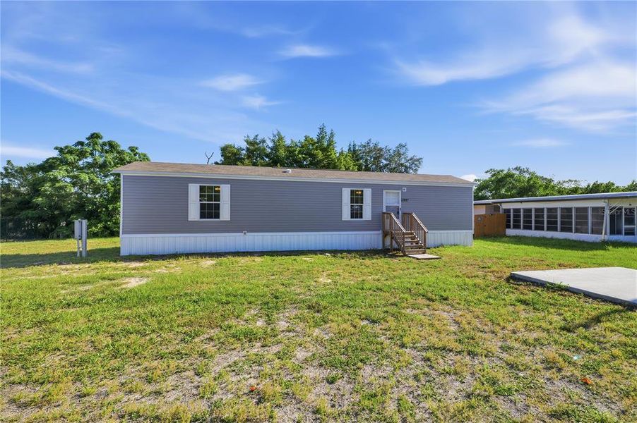 Exterior details and patio area of a home in , Brooksville (Image 24).