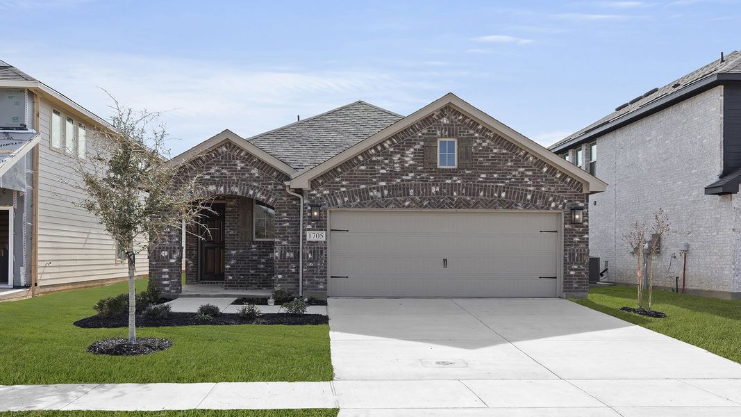 Front exterior of a new home in Keeneland, Aubrey, TX, highlighting curb appeal (Image 1). Front exterior of a new home in Keeneland, Aubrey, TX, highlighting curb appeal (Image 1).