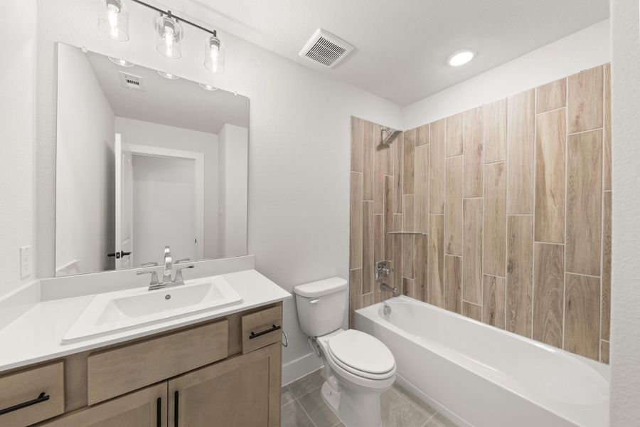 Furnished interior view inside a new home in Union Park, Little Elm (Image 11).