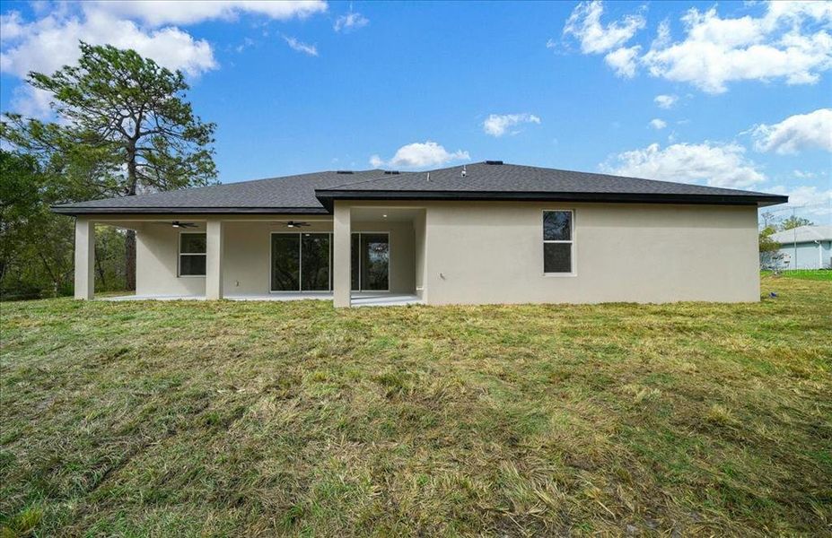 Exterior details and patio area of a home in , Weeki Wachee (Image 37).