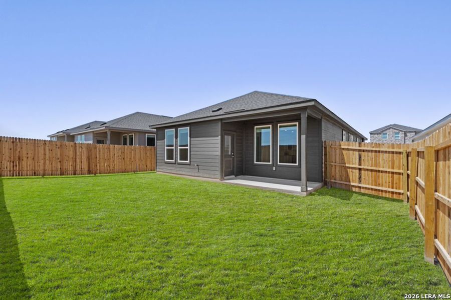 Exterior details and patio area of a home in Juniper Ranch, Spring Branch (Image 3).