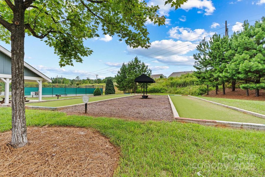 The community also features bocce ball courts—perfect for laid-back competition, socializing with neighbors, and enjoying the outdoors in a fun, relaxed setting The community also features bocce ball courts—perfect for laid-back competition, socializing with neighbors, and enjoying the outdoors in a fun, relaxed setting