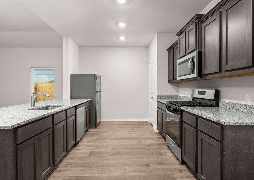 The kitchen of the Reed has gorgeous wood cabinetry. The kitchen of the Reed has gorgeous wood cabinetry.