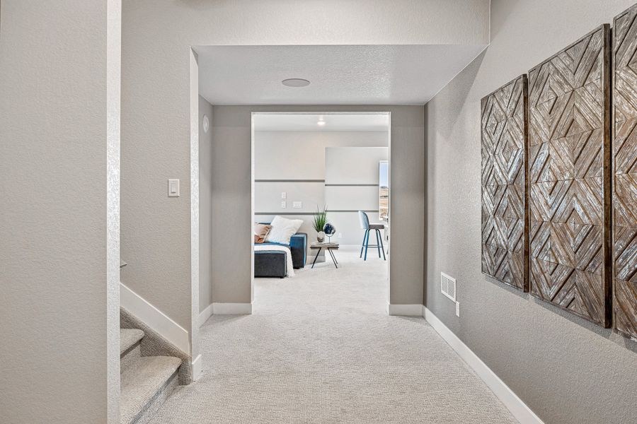 Representative furnished interior of a home built from the Roxborough by Taylor Morrison in Trailstone, Arvada (Image 26).