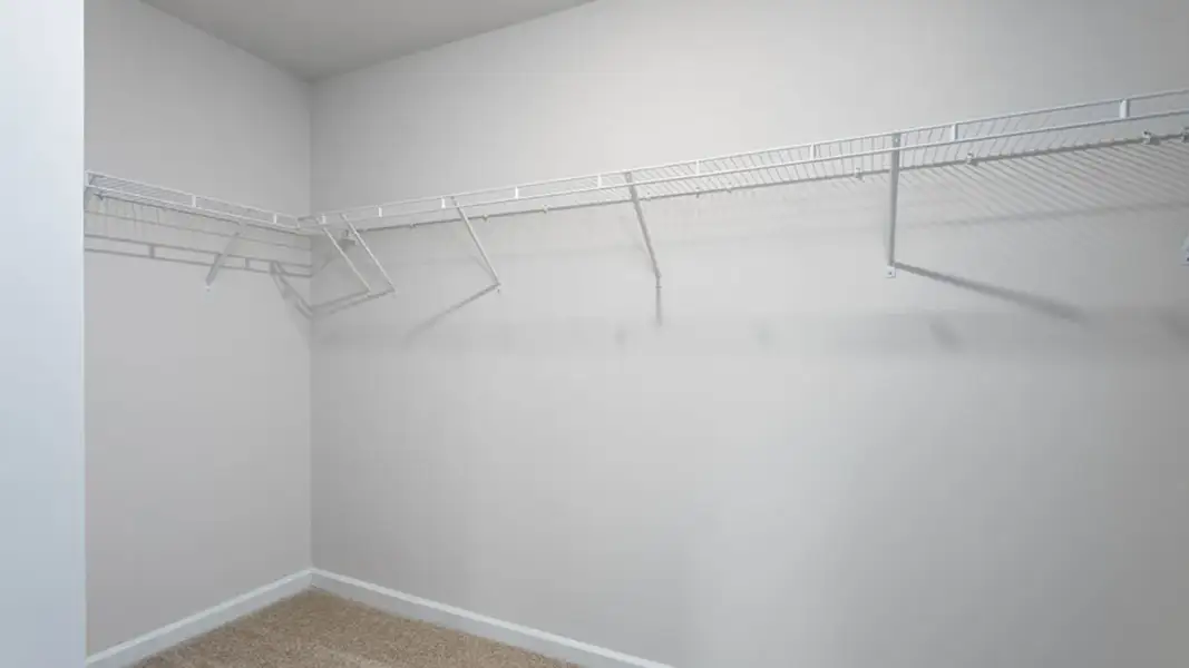 Spacious, unfurnished interior of a new home in The Estates at Edinborough, Gibsonville (Image 20).
