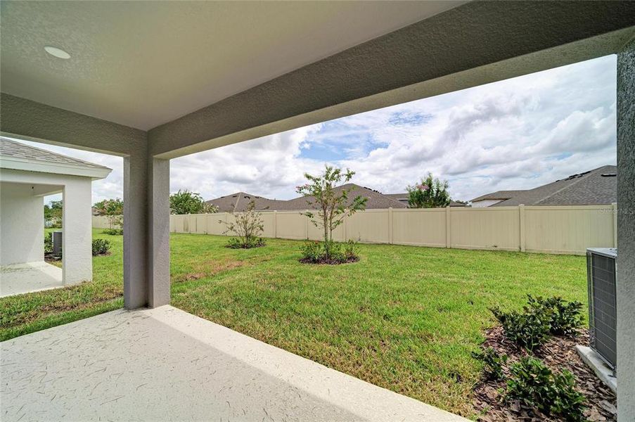 Exterior details and patio area of a home in Crosswind Point, Parrish (Image 22).