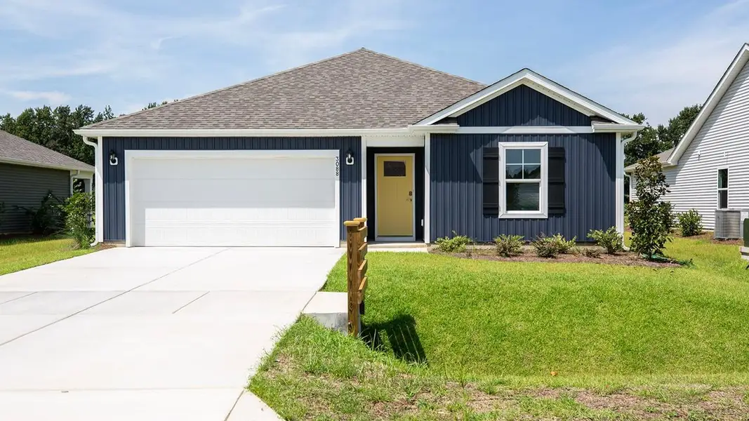Front exterior of a new home in Halls Landing, Bolivia, NC, highlighting curb appeal (Image 1). Front exterior of a new home in Halls Landing, Bolivia, NC, highlighting curb appeal (Image 1).