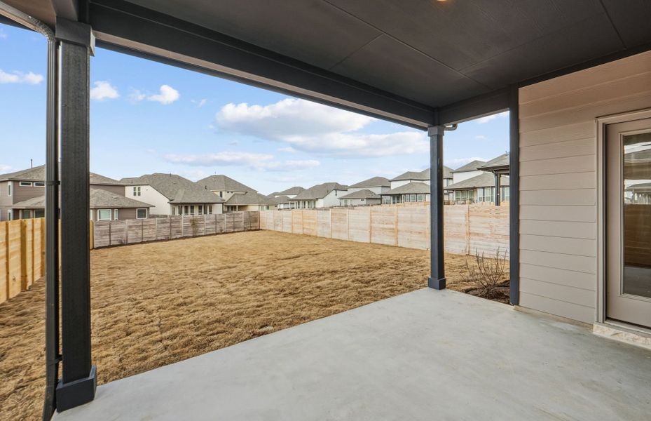 Exterior details and patio area of a home in Horizon Lake, Leander (Image 26).