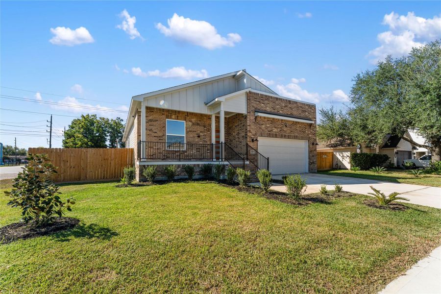 Front exterior of a new home in , Houston, TX, highlighting curb appeal (Image 21).