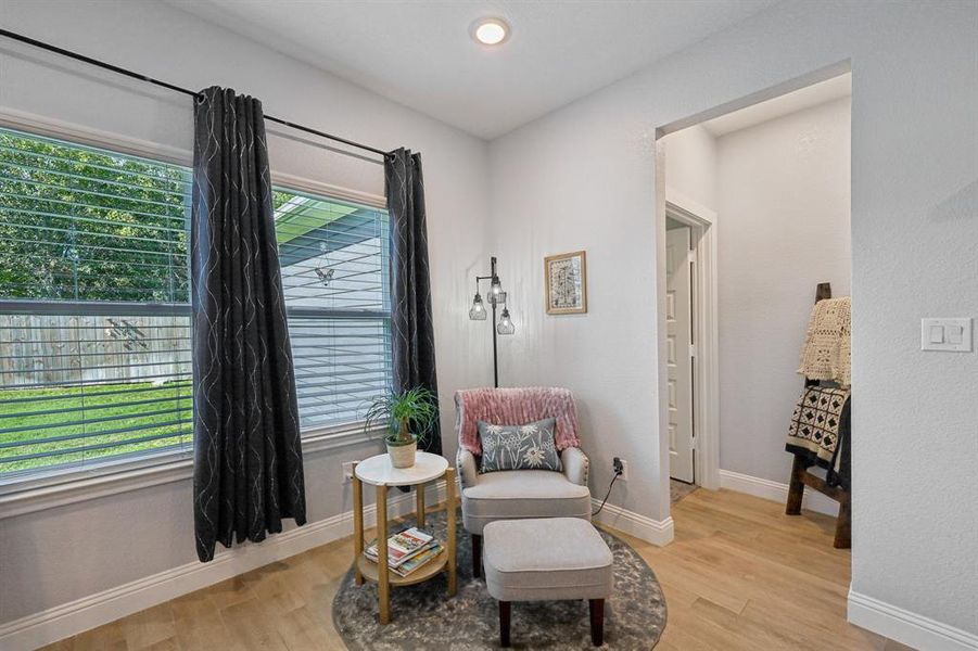 Living area featuring light wood-style flooring Living area featuring light wood-style flooring