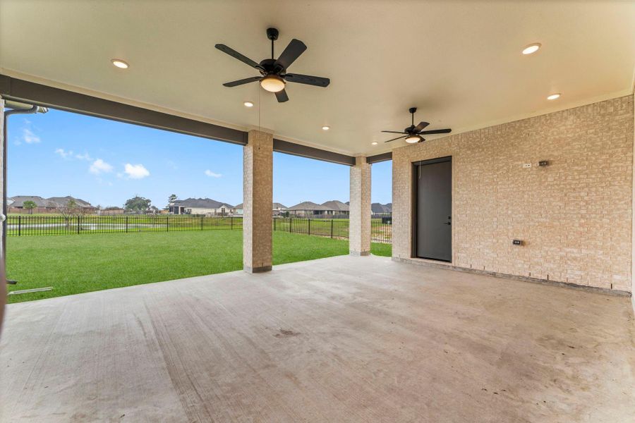 Exterior details and patio area of a home in , Tomball (Image 4).