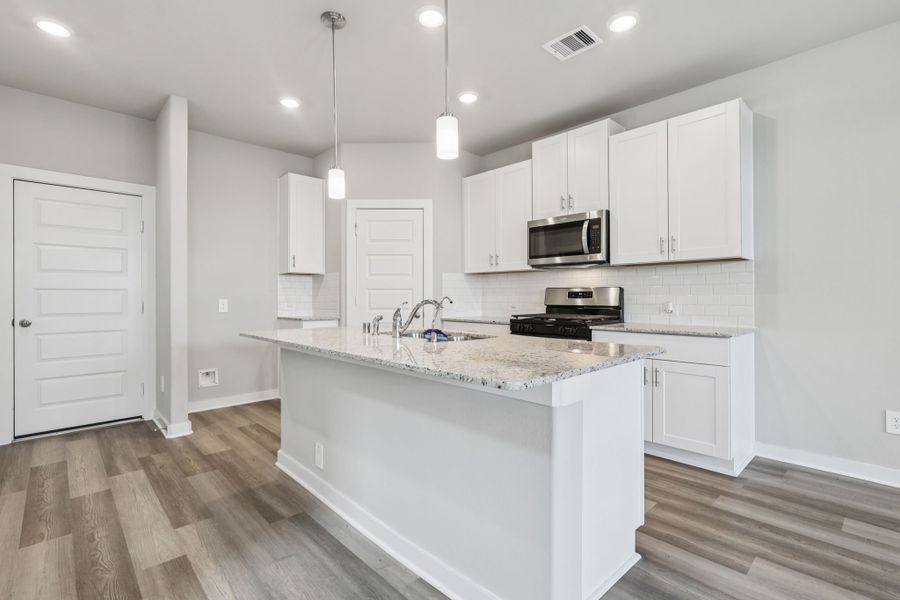 Furnished interior view inside a new home in Kemah Crossing - City Series, Kemah (Image 8). Furnished interior view inside a new home in Kemah Crossing - City Series, Kemah (Image 8).