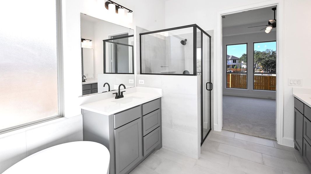 Furnished interior view inside a new home in 6 Creeks, Kyle (Image 14).