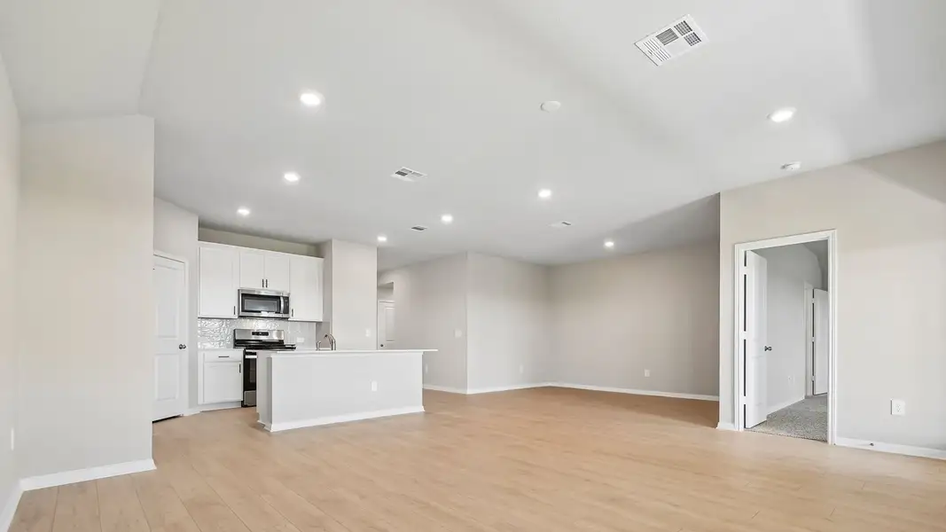 Spacious, unfurnished interior of a new home in Carillon, Manor (Image 14).