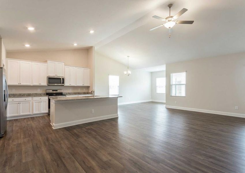 Burton open floor plan with wood flooring, large kitchen island, and ceiling fan