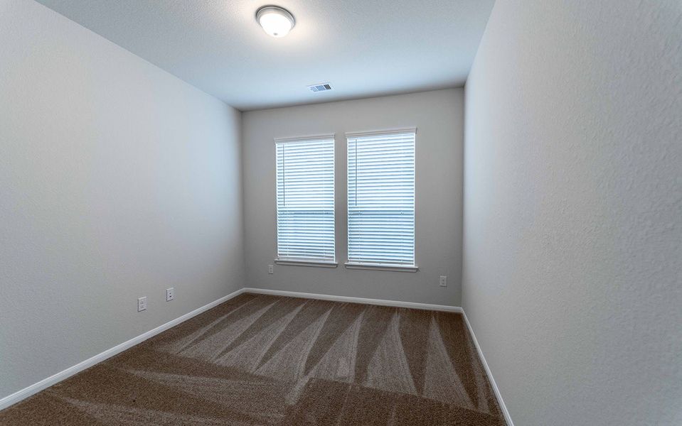 Spacious, unfurnished interior of a new home in Canterra Creek, Iowa Colony (Image 35). Spacious, unfurnished interior of a new home in Canterra Creek, Iowa Colony (Image 35).