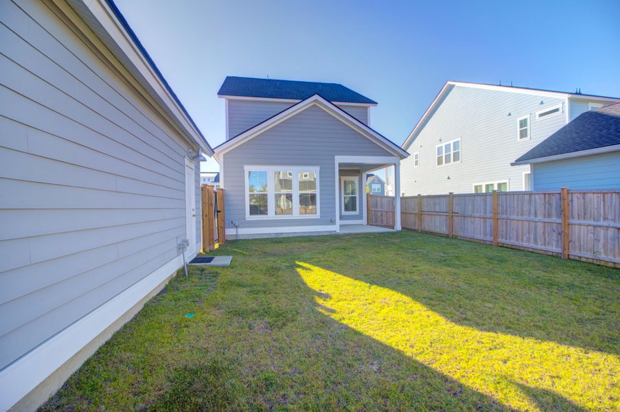 Exterior details and patio area of a home in Carnes Crossroads: Row Collection, Summerville (Image 24). Exterior details and patio area of a home in Carnes Crossroads: Row Collection, Summerville (Image 24).