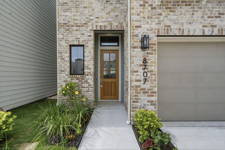 Exterior details and patio area of a home in Spring Valley Creek, Houston (Image 3).
