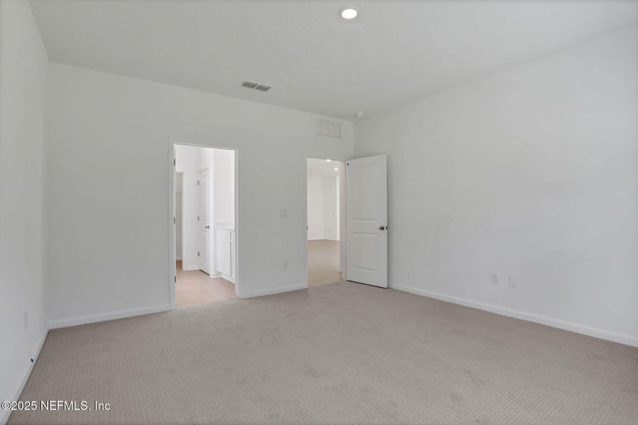 Spacious, unfurnished interior of a new home in Cordova Palms, St. Augustine (Image 33).