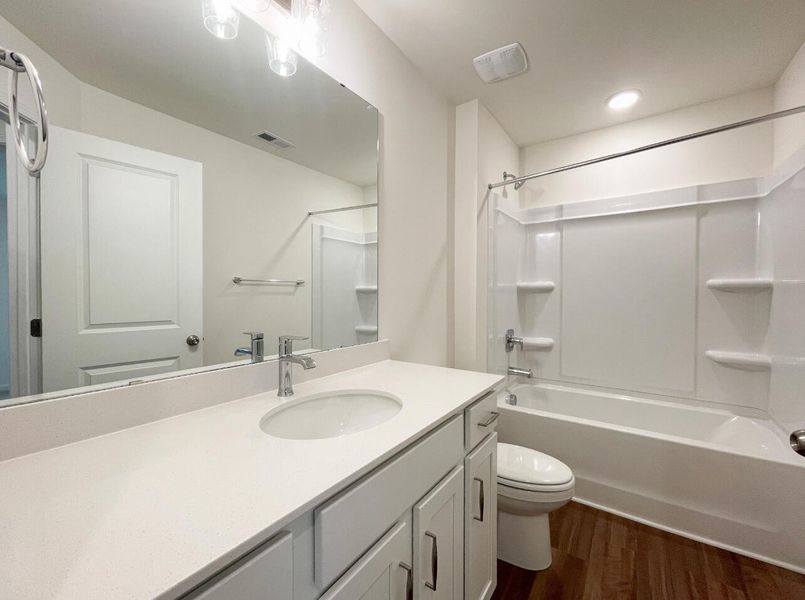Furnished interior view inside a new home in Bellevue Townhomes, Greenville (Image 10).