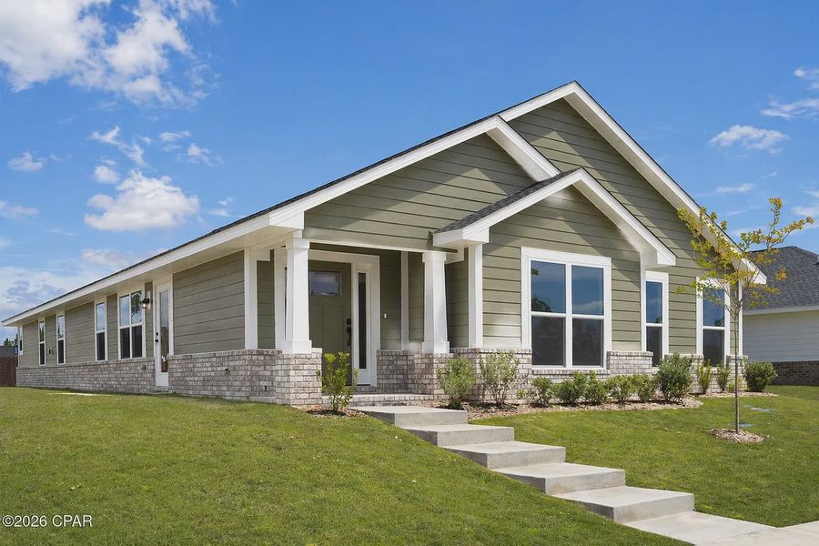 Front exterior of a new home in East Bay, Panama City, FL, highlighting curb appeal (Image 2). Front exterior of a new home in East Bay, Panama City, FL, highlighting curb appeal (Image 2).