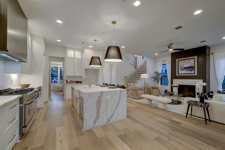 Another view of this gorgeous kitchen, which flows seamlessly into the living room*photos are of a previously constructed home by the builder. 1406 Thornton may have different selections at builders sole discretion. These photos are not meant to be an exact representation of 1406 Thornton.