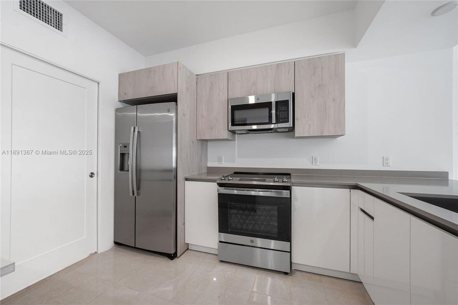 Furnished interior view inside a new home in , Dania Beach (Image 11).