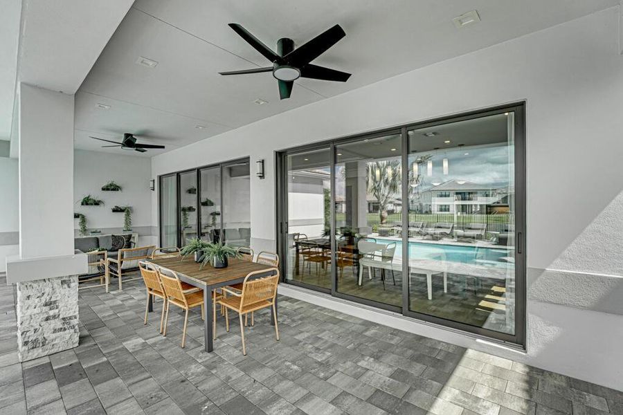 Exterior details and patio area of a home in Apex at Avenir, Palm Beach Gardens (Image 41).