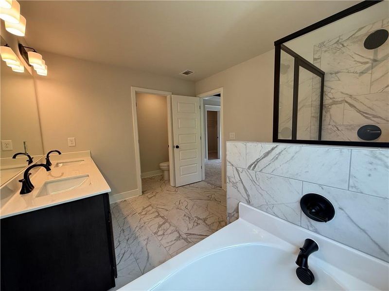 Furnished interior view inside a new home in The Towns at Auburn Station East, Auburn (Image 10).