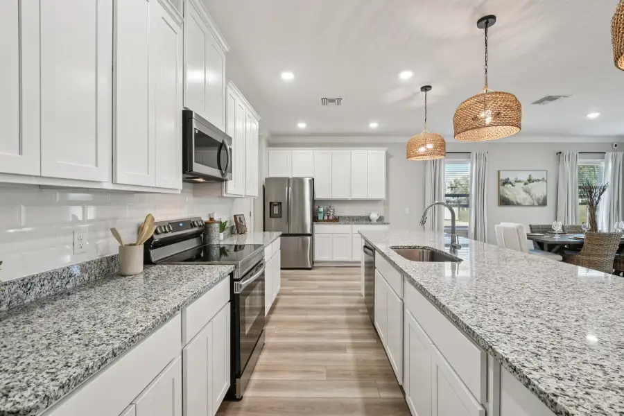 Representative furnished interior of a home built from the Drexel by Maronda Homes in Highland Park, Newberry (Image 14). Representative furnished interior of a home built from the Drexel by Maronda Homes in Highland Park, Newberry (Image 14).