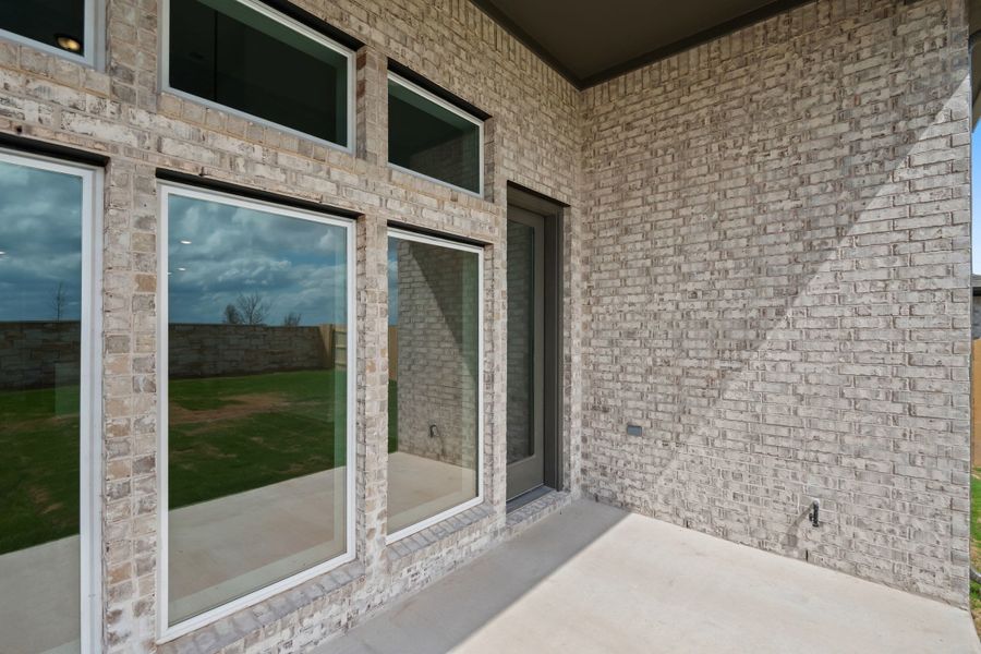 Exterior details and patio area of a home in Flora, Hutto (Image 30).