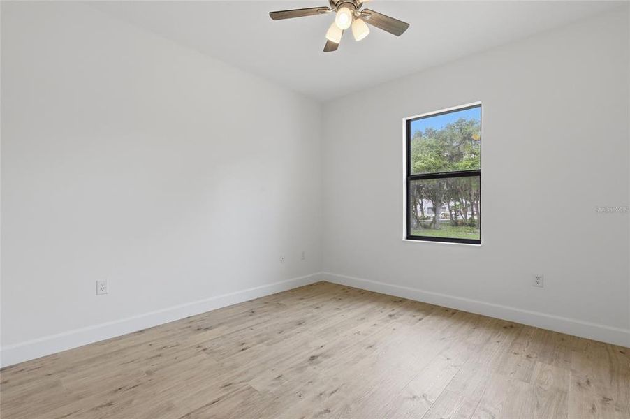 Spacious, unfurnished interior of a new home in , Port Charlotte (Image 32).
