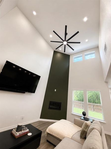 Vaulted ceilings featuring recessed lighting and an expansive ceiling fan