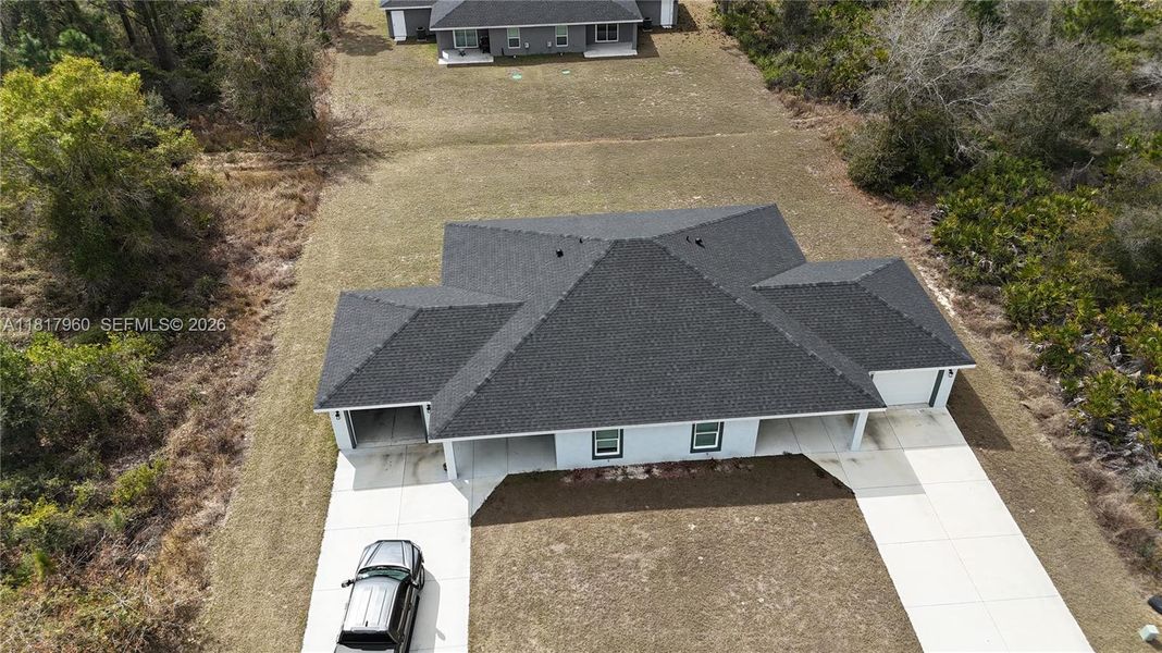 Front exterior of a new home in , Sebring, FL, highlighting curb appeal (Image 21).