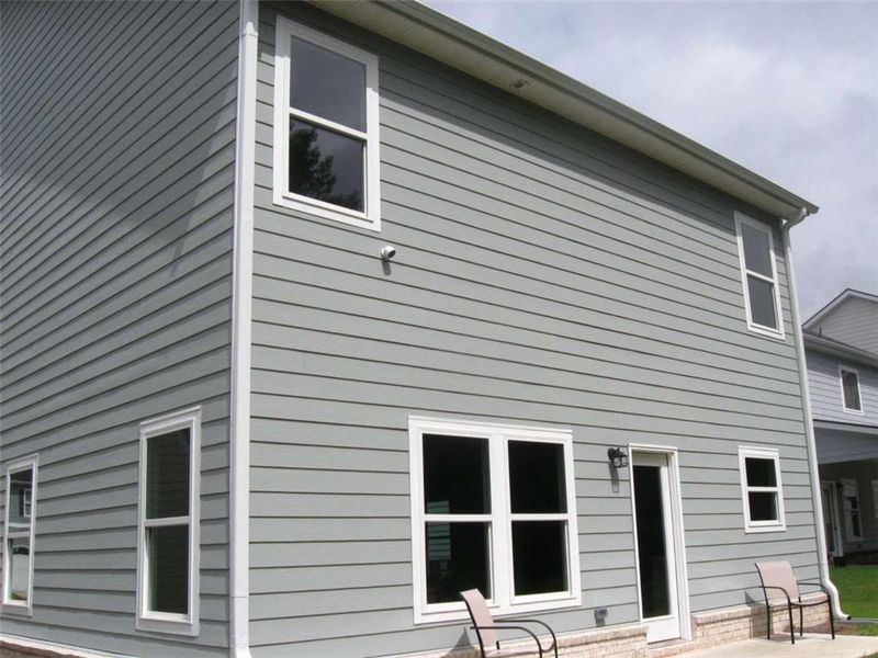 Exterior details and patio area of a home in Neely Farm, Covington (Image 2). Exterior details and patio area of a home in Neely Farm, Covington (Image 2).